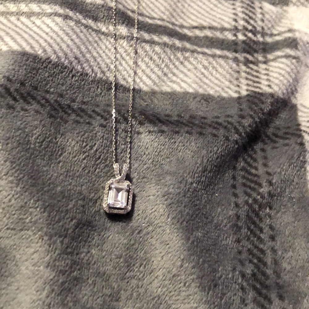 Silver with diamonds and birth stone of February